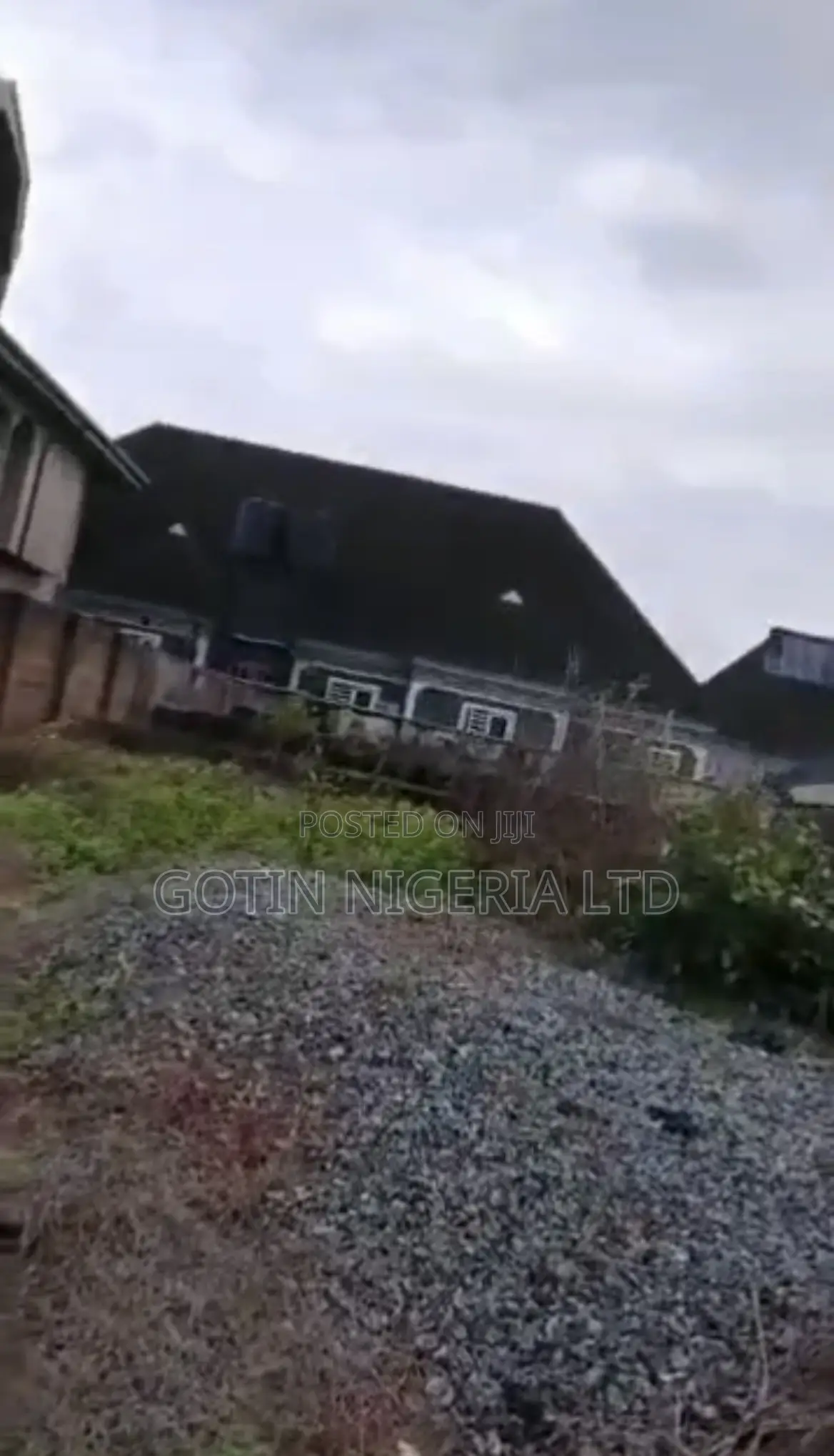 50×100ft Land With Building at DPC Level for Sale