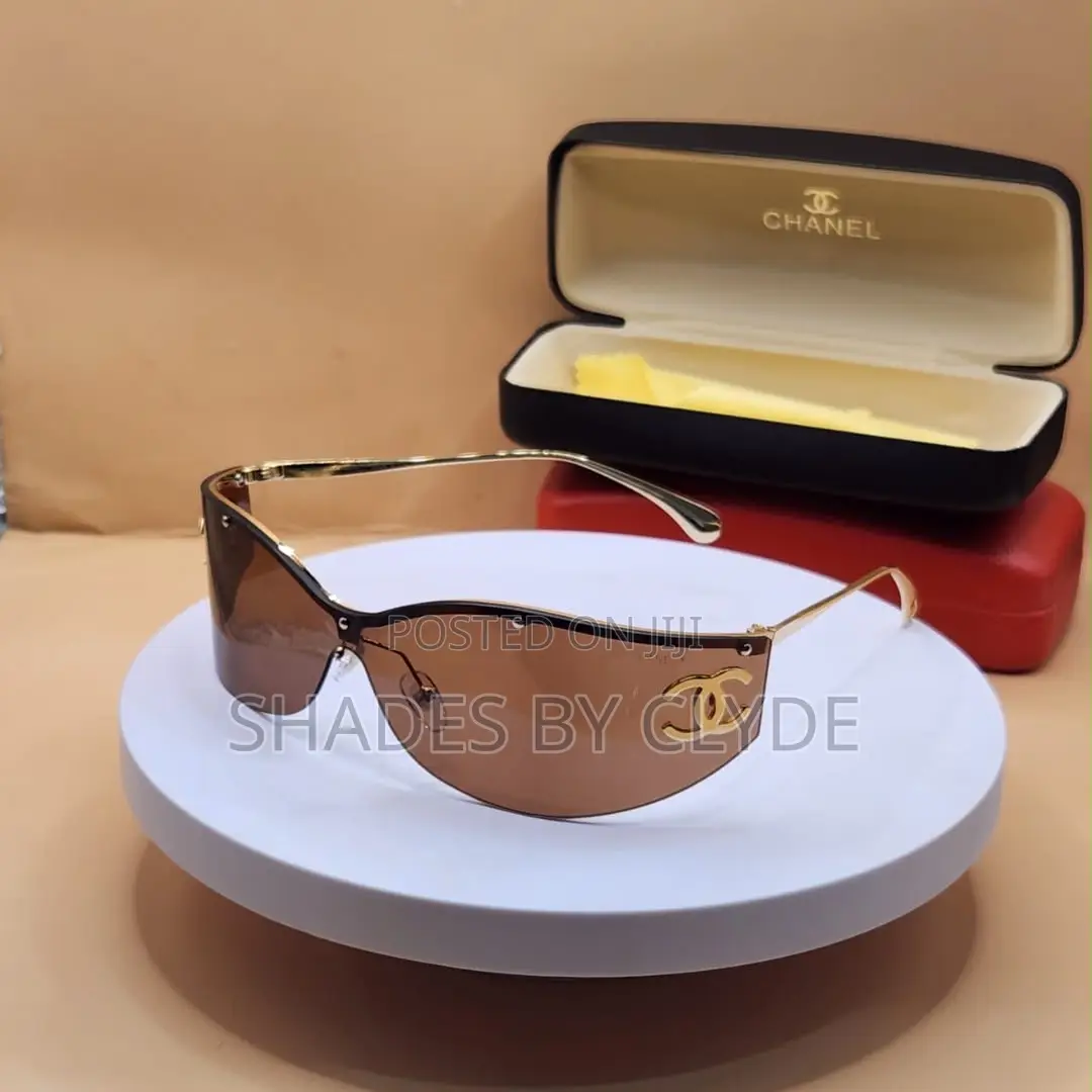 Luxury Chanel Gold-Trimmed Shield Sunglasses – Statement Piece