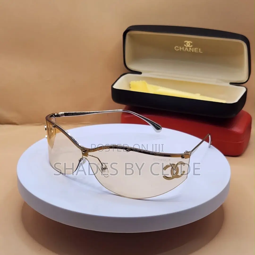 Luxury Chanel Gold-Trimmed Shield Sunglasses – Statement Piece