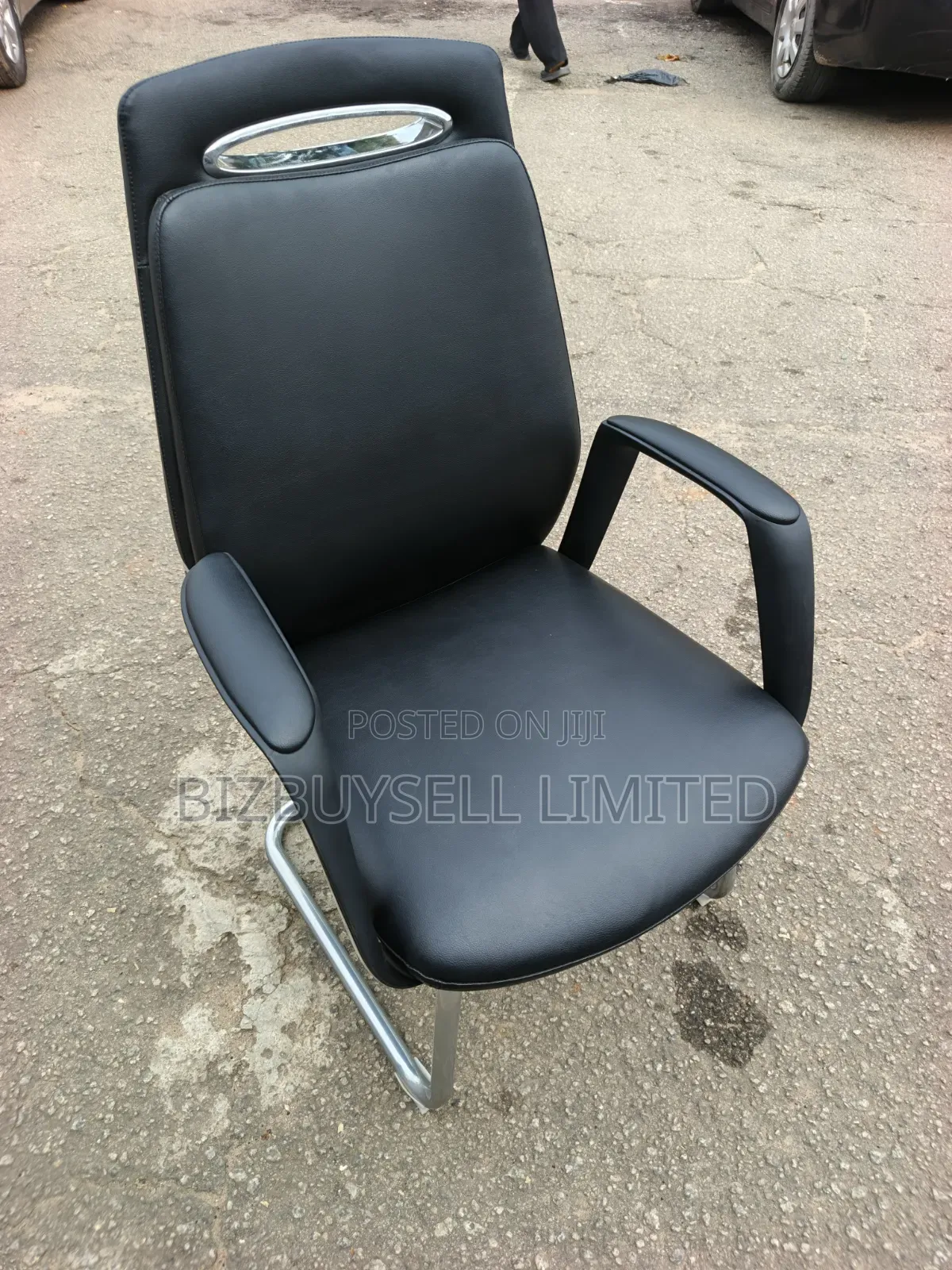 Black Leather Office Visitor or Conference Chair With Fixe