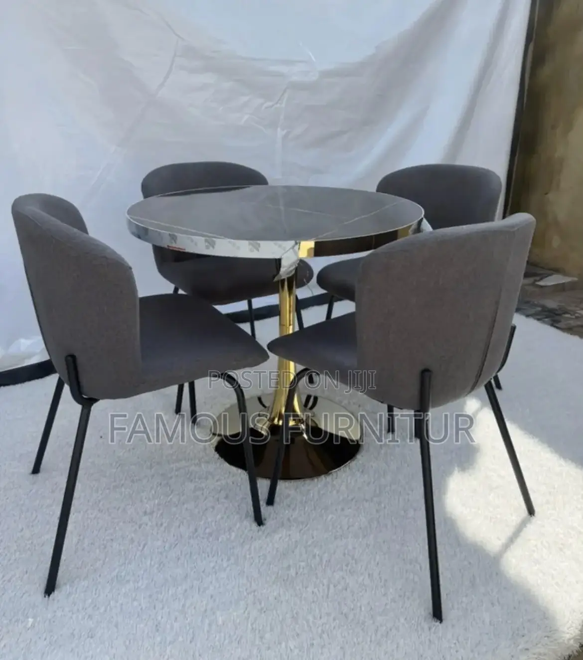 Modern 4 _Piece Round Dining Set Featuring a Black Faux-Marble Top