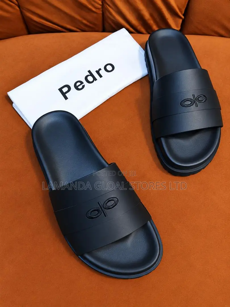 Pedro Monogram Debossed Slide Sandals in Black