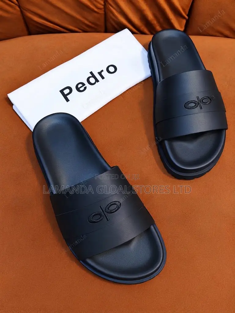 Pedro Monogram Debossed Slide Sandals in Black