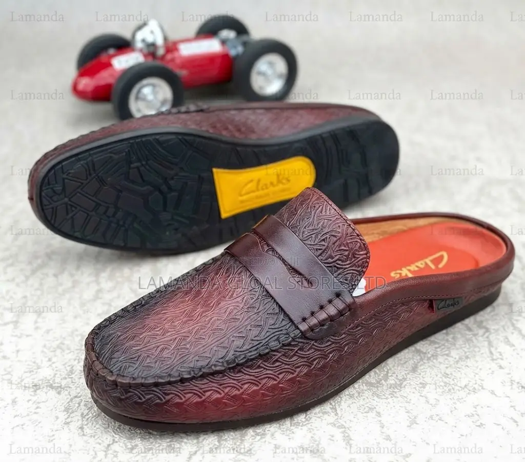 Clarks Embossed Leather Penny Loafer Mules in Brown