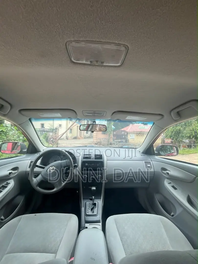 Toyota Corolla Base 4dr Sedan (1.8L 4cyl 5M) 2010 Red