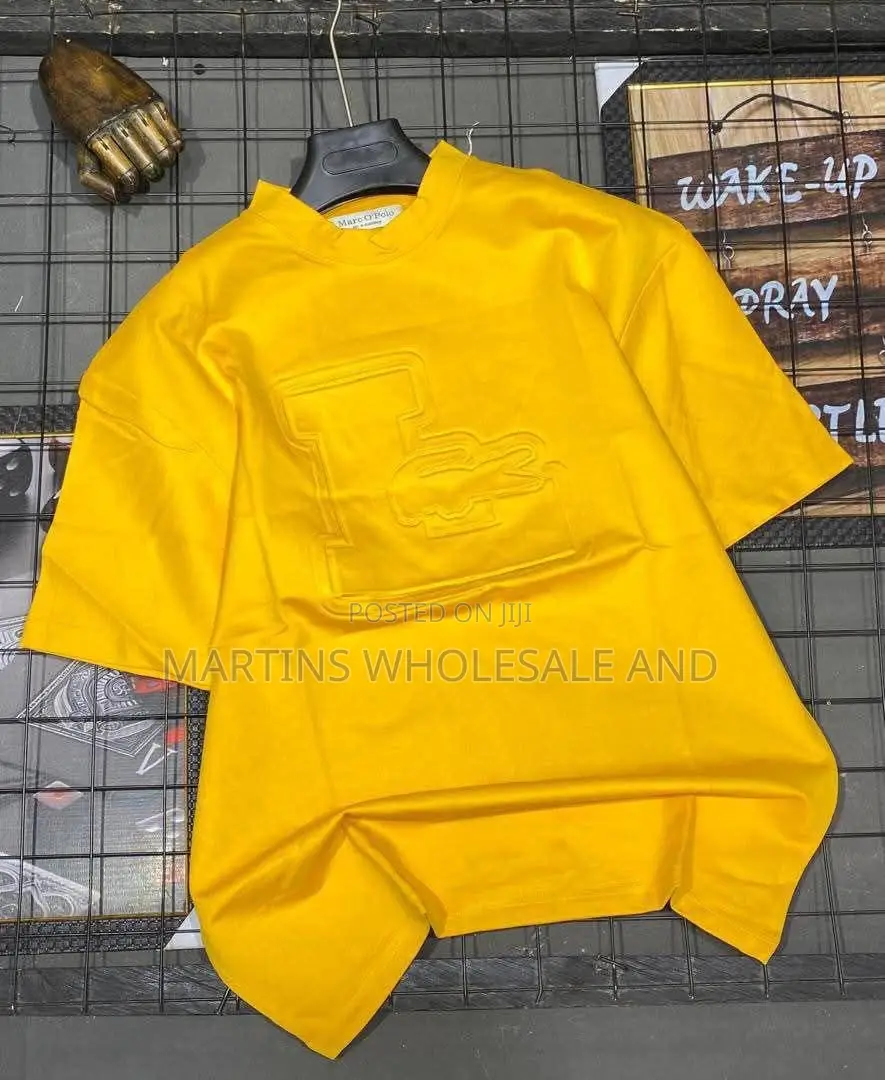 Casual, Short-Sleeve Crewneck T-Shirts Featuring Embossed Chest Graphi