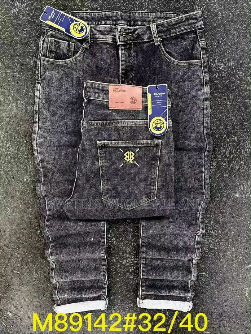Men's Acid-Wash Ala Jeans Featuring a Striking Black and Yellow Speckl