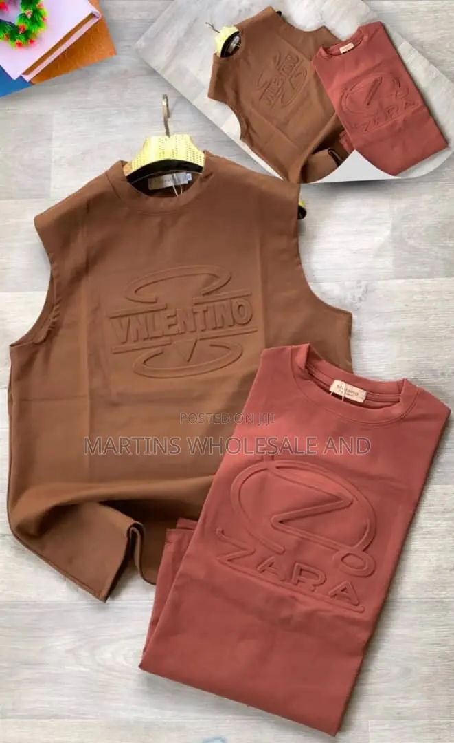 Brown Sleeveless Top Featuring an Embossed Valentino Logo on the Front