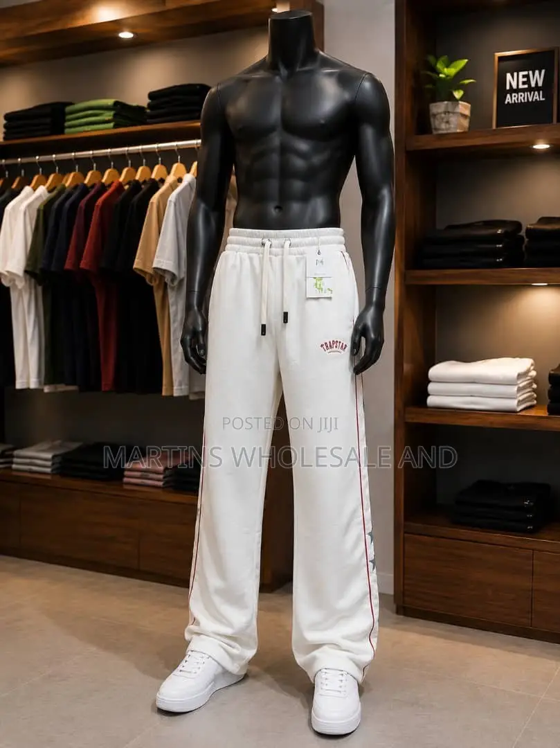 A Pair of Black and Light Grey Colorblock Jogger Pants Featuring