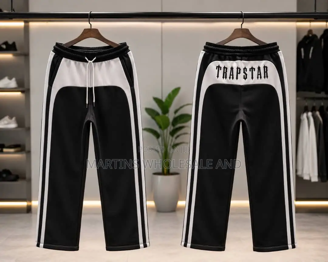 A Pair of Black and Light Grey Colorblock Jogger Pants Featuring
