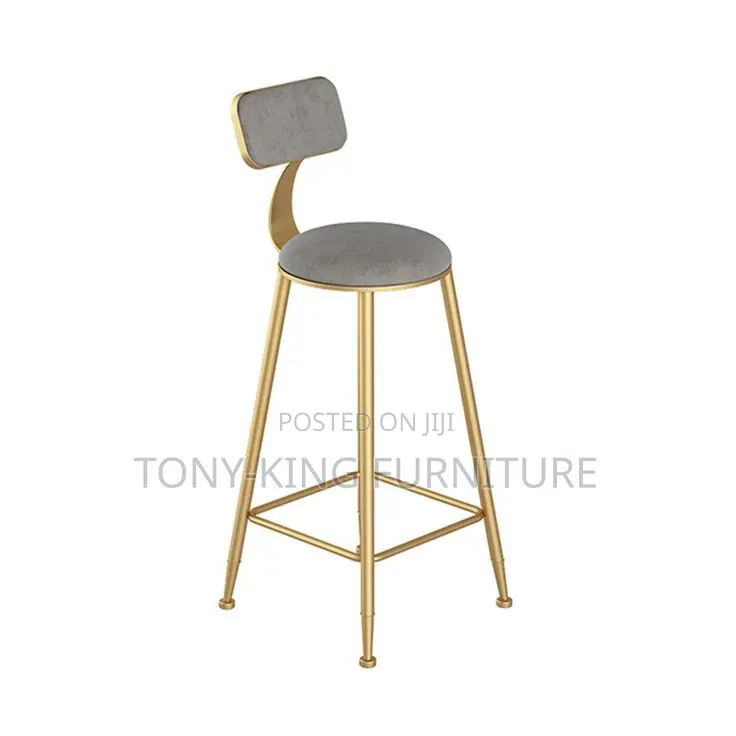 Modern Minimalist Gold Bar Stool Features a Sleek Metallic Frame.