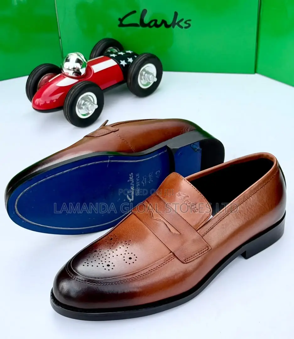 Clarks Brogue Leather Penny Loafers in Tan