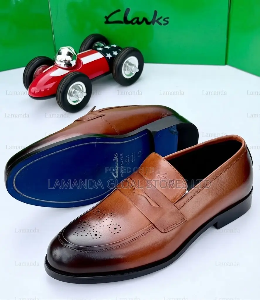 Clarks Brogue Leather Penny Loafers in Tan