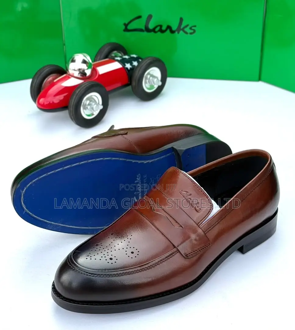 Clarks Brogue Leather Penny Loafers in Brown