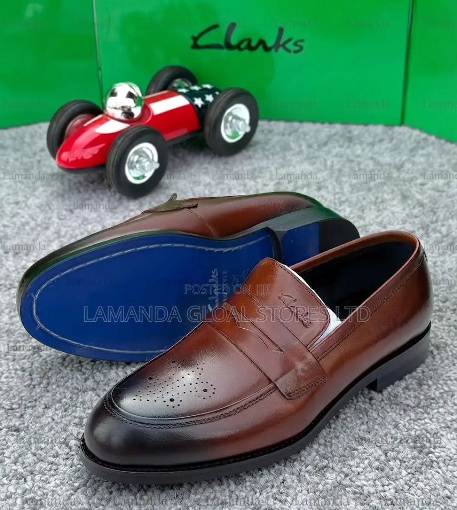 Clarks Brogue Leather Penny Loafers in Brown