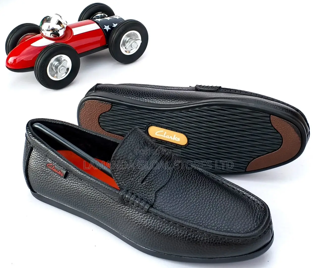 Clarks Pebbled Leather Penny Loafers in Black