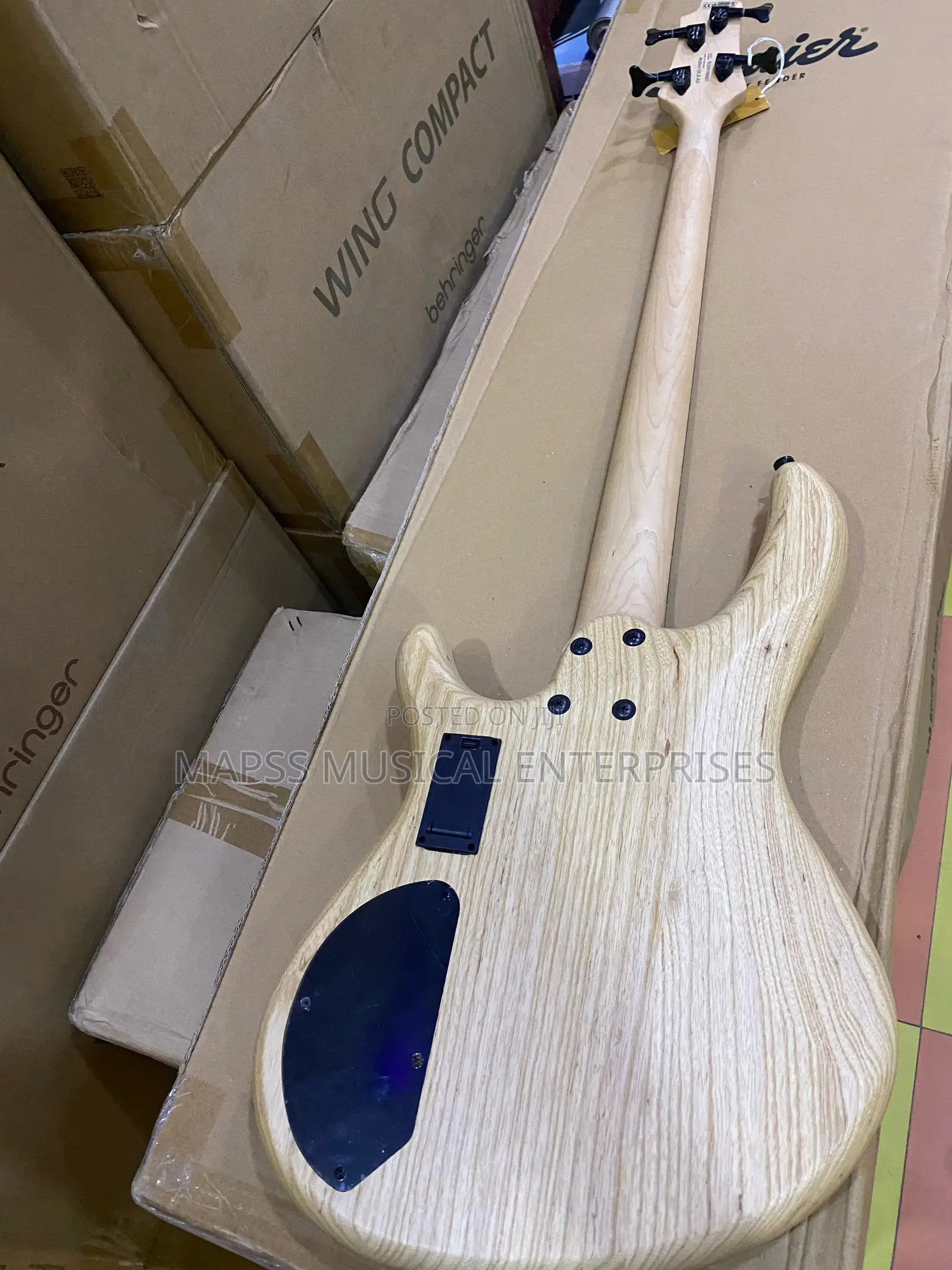 Cort Action DLX AS Open Pore Natural 4-String Electric Bass Guitar