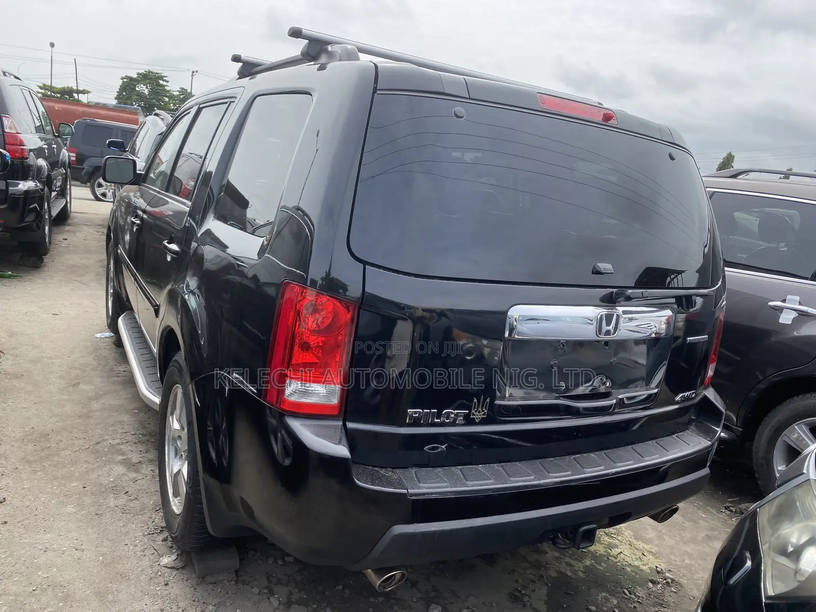 Honda Pilot Touring w/RES/Navi 4WD (3.5L 6cyl 5A) 2011 Black
