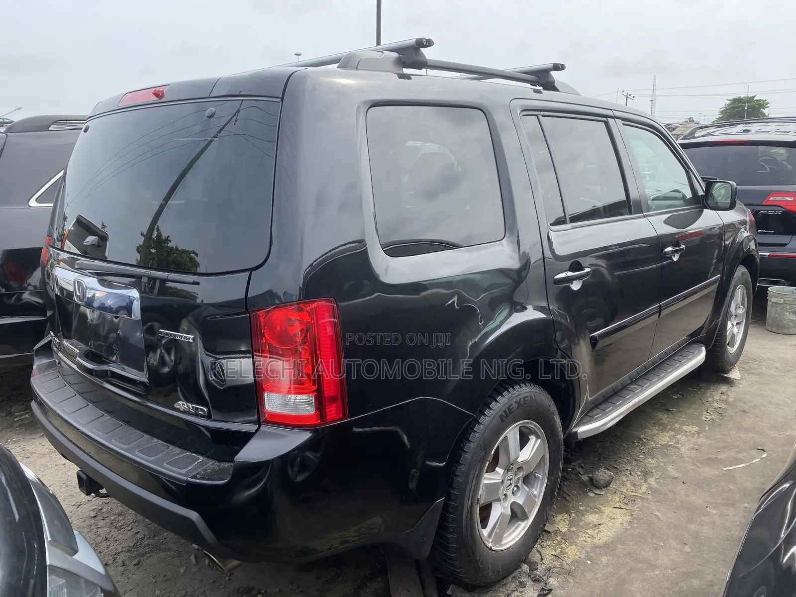 Honda Pilot Touring w/RES/Navi 4WD (3.5L 6cyl 5A) 2011 Black