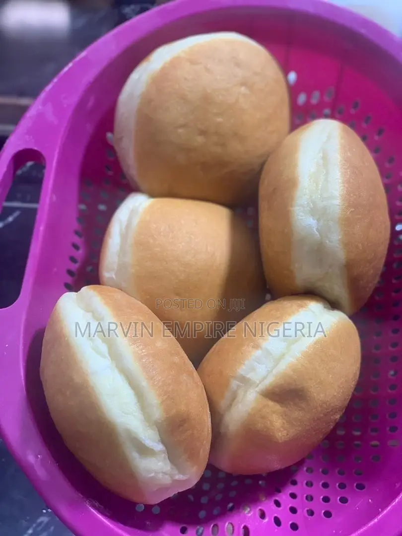 A Box of 6 Sugar or Jam Donuts