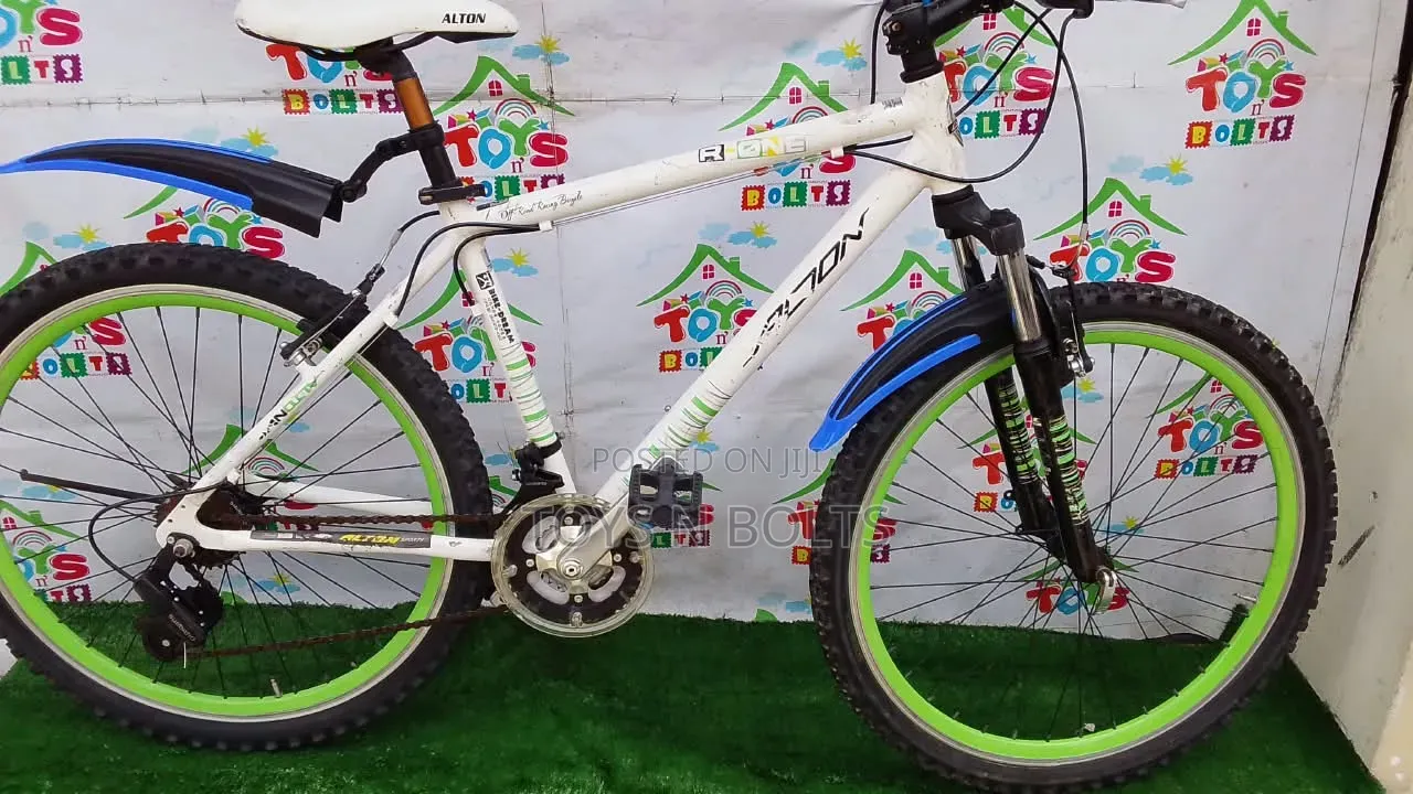 Adult Bicycle Size 26 Alton Bike With Green Rim and Front Shocks