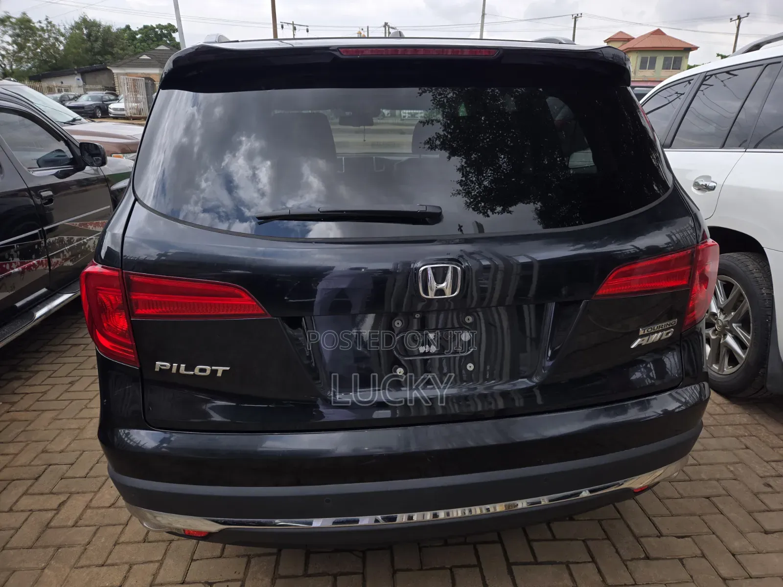 Honda Pilot Touring 4dr SUV 4WD (3.5L 6cyl 9A) 2017 Black