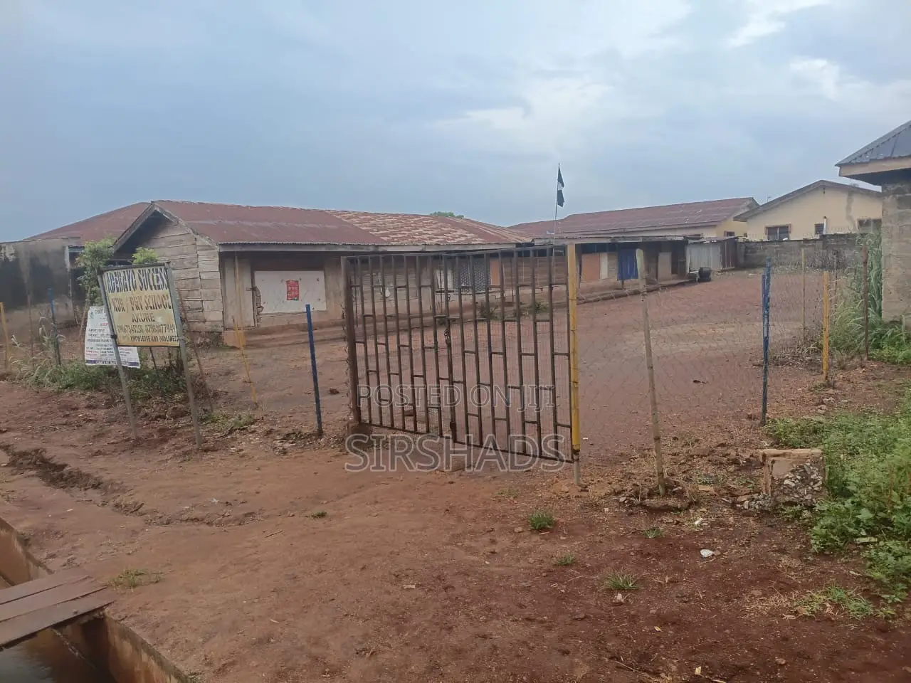 A Full Plot of Land on a Tied Road at OSRC Road, Orita Obele