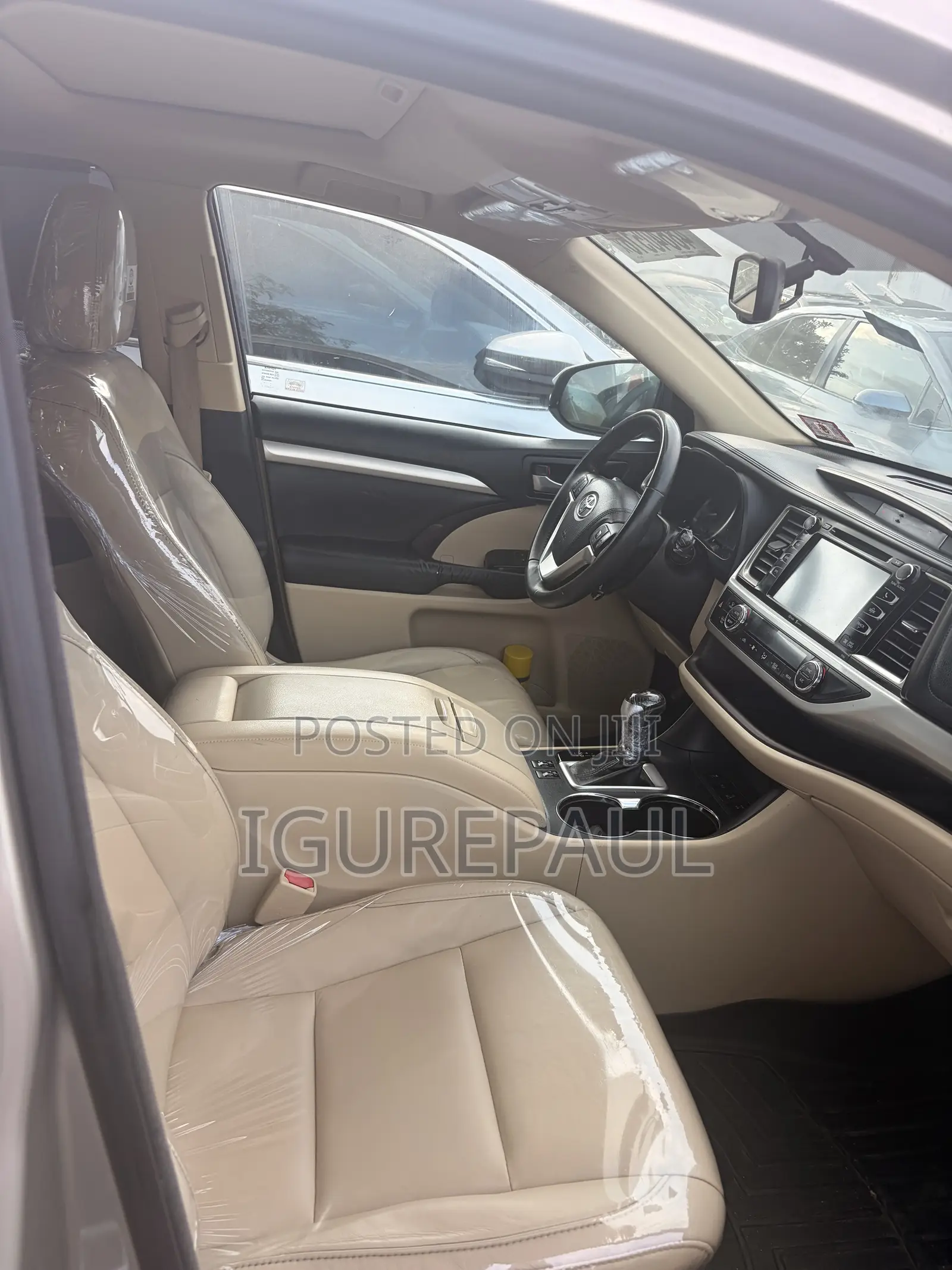 Toyota Highlander XLE V6 4x4 (3.5L 6cyl 6A) 2016 Gold