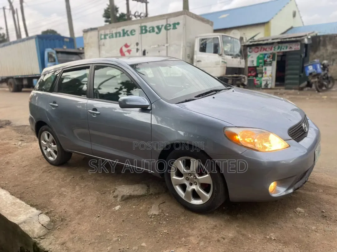 Toyota Matrix Hatchback AWD (1.8L 4cyl 4A) 2005 Blue