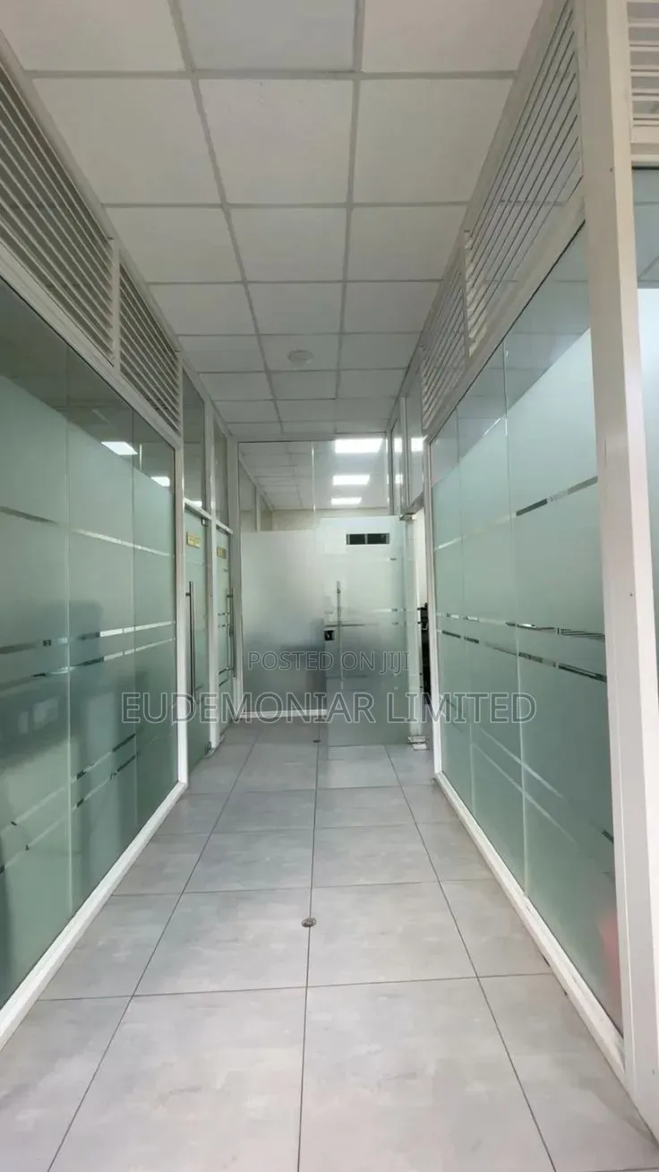 Half-Height Glass Partition Installation for Offices