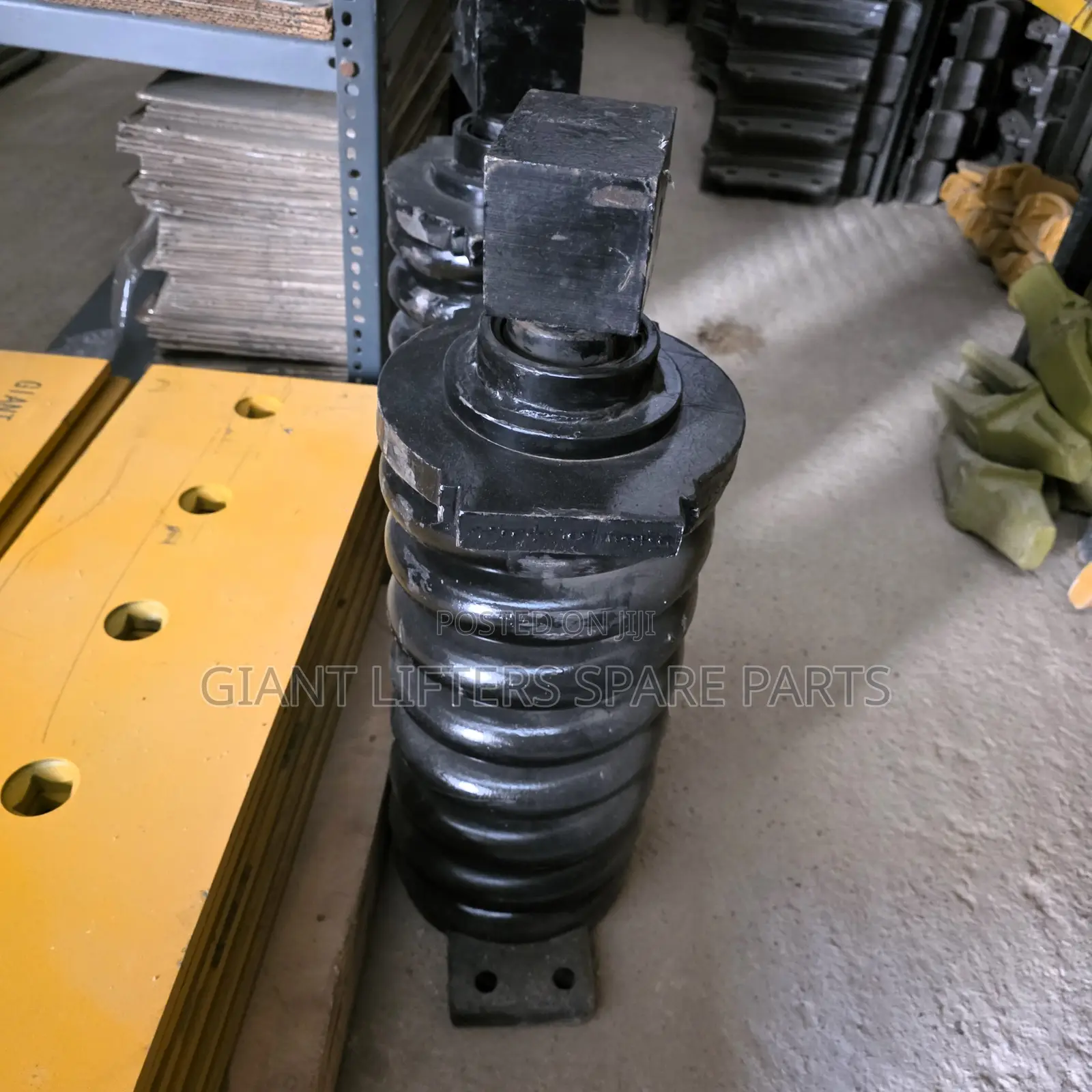 Track Adjuster / Recoil Spring