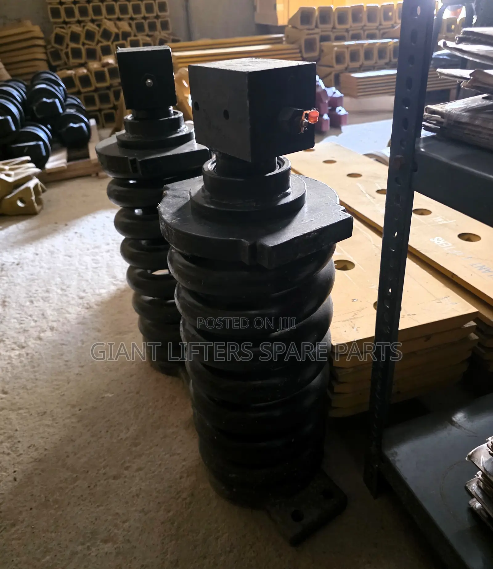 Track Adjuster / Recoil Spring