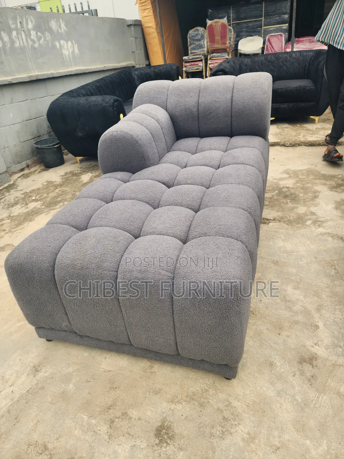 Neatly Padded L-Shaped Fabric Sofa.