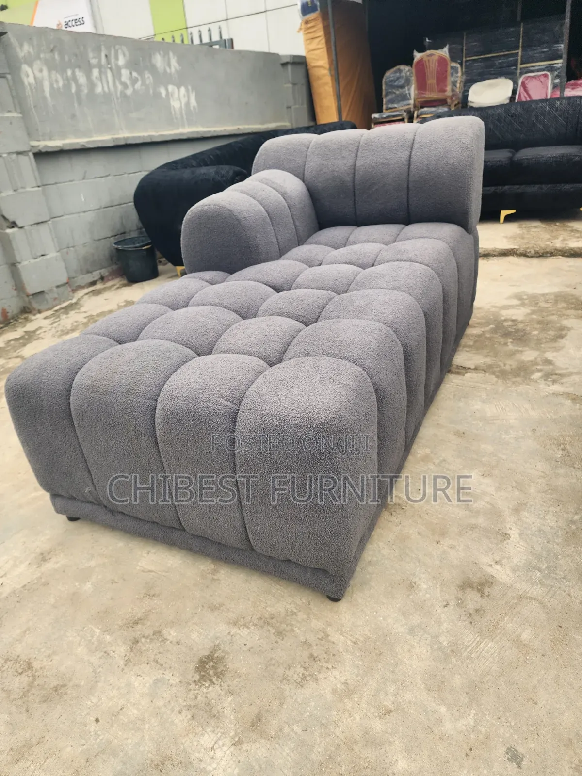 Neatly Padded L-Shaped Padded Sofa Chair.