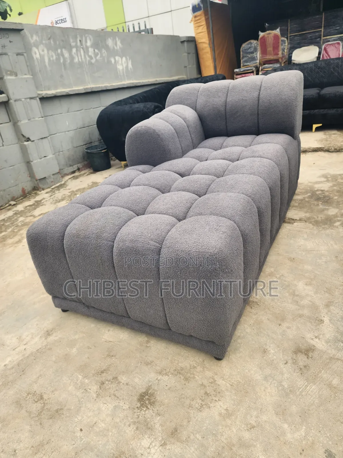 Neatly Padded L-Shaped Padded Sofa Chair.