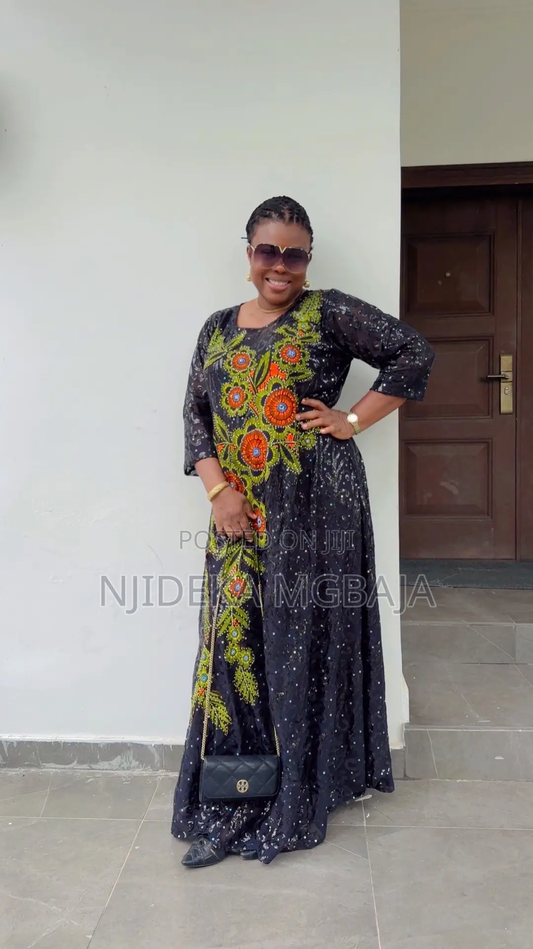 Elegant Black Lace and Ankara Maxi Gown With Floral Embroidery