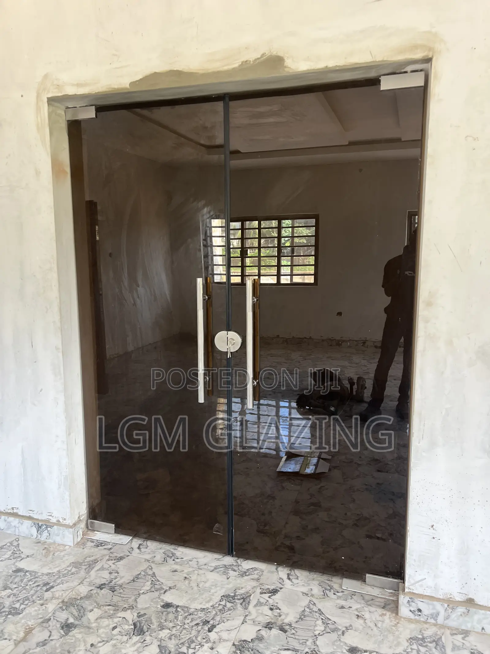 Brown Tinted Tempered Glass Swing Door – Custom Made Installed