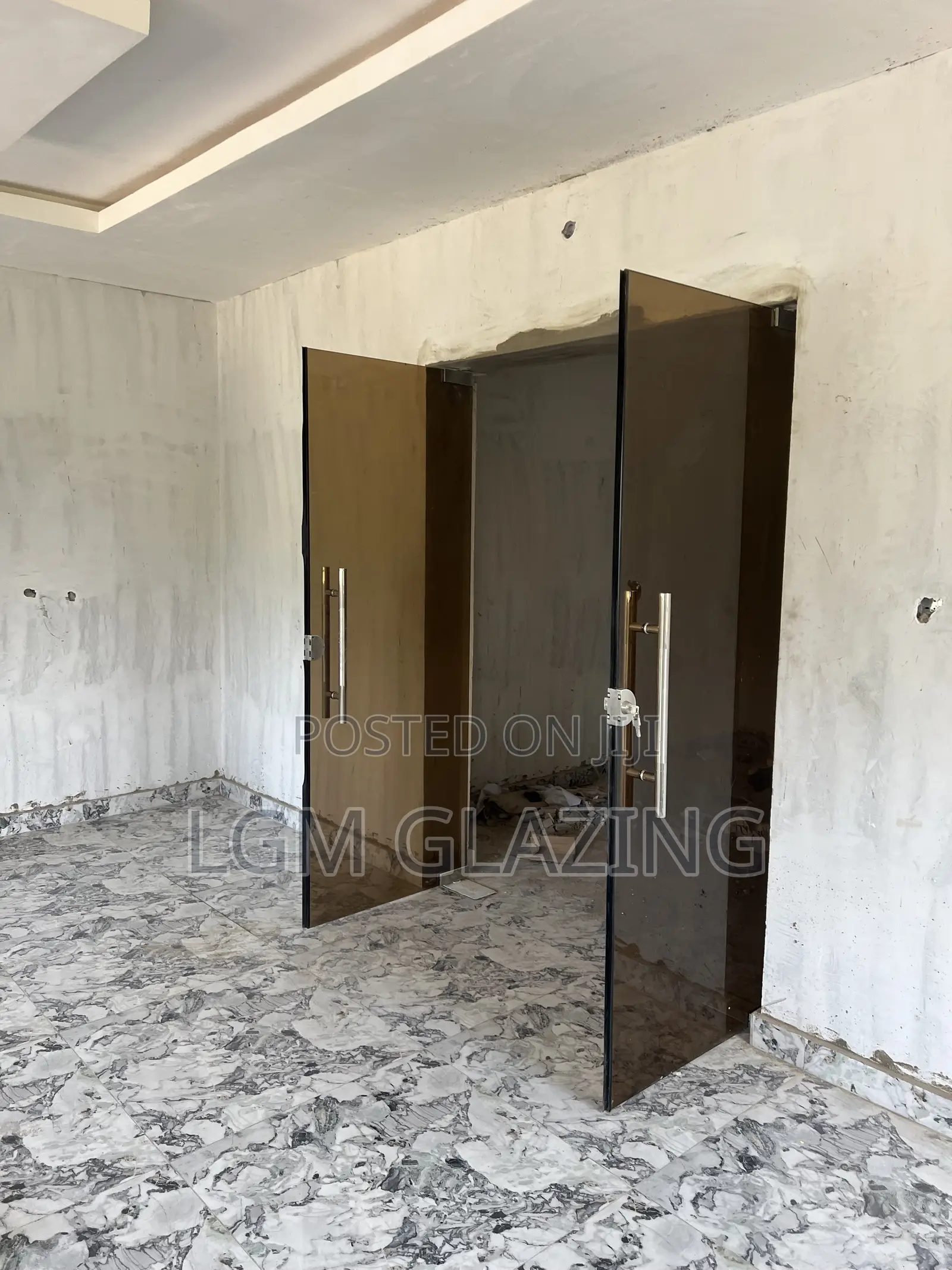 Brown Tinted Tempered Glass Swing Door – Custom Made Installed