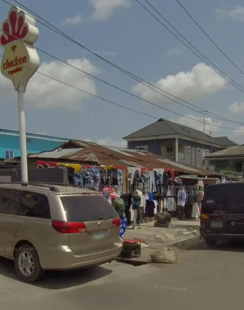 A Bungalow, Consist of Rooms and (8 Units) of Shops, on a Corner Piece