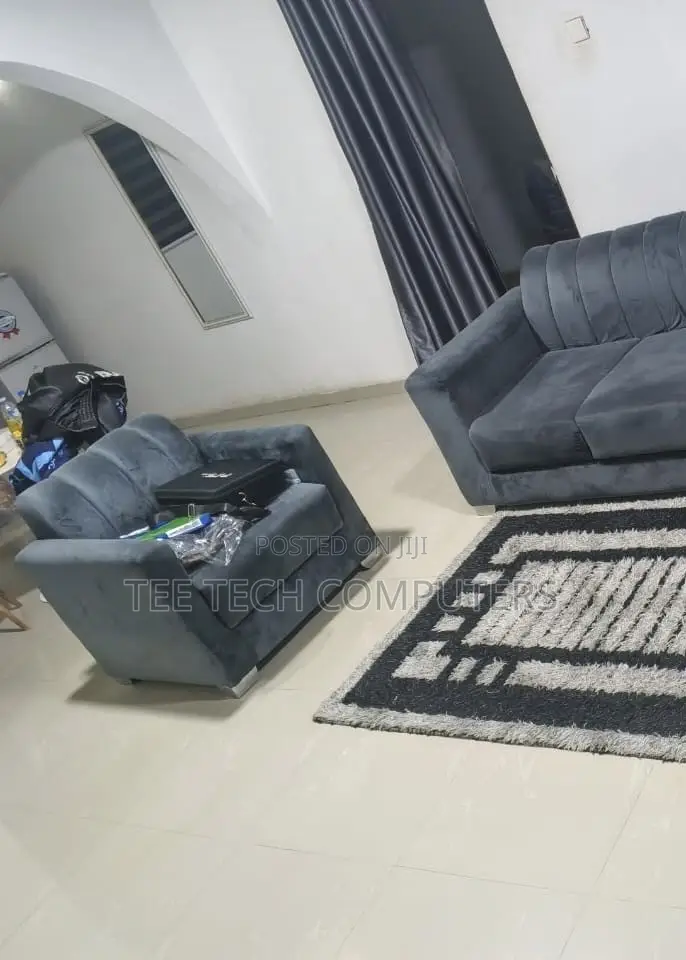 L-Shaped Chair and One 1 Seater