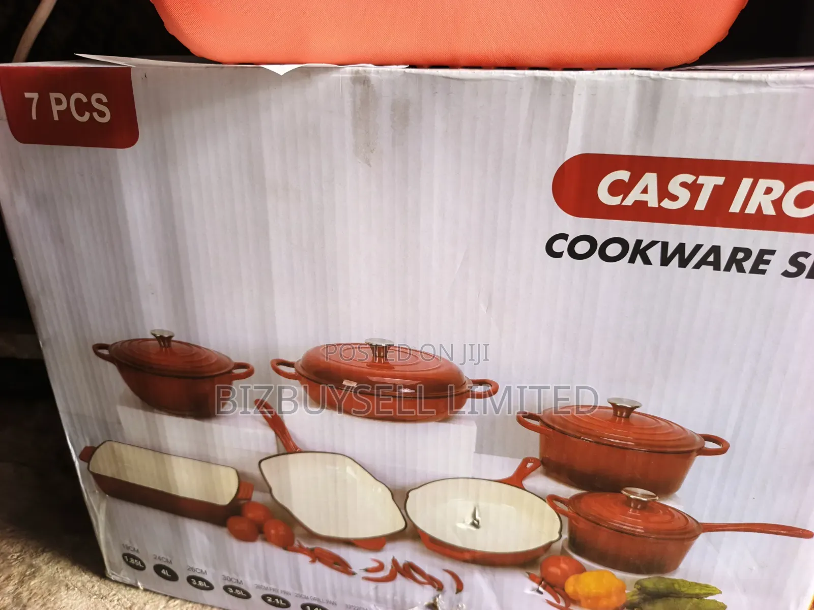 7-Piece Enameled Cast Iron Cookware Set Featuring Red-Orange Dutch