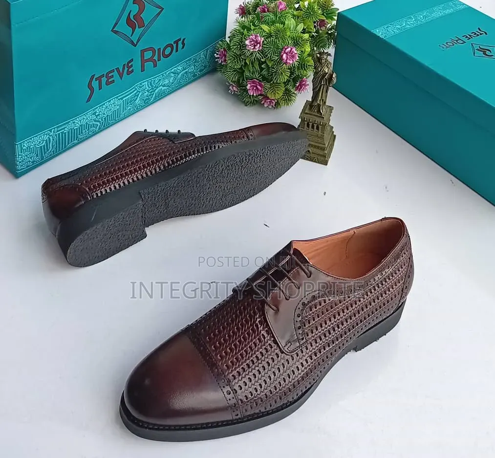 Brown Woven Cap-Toe Derby.