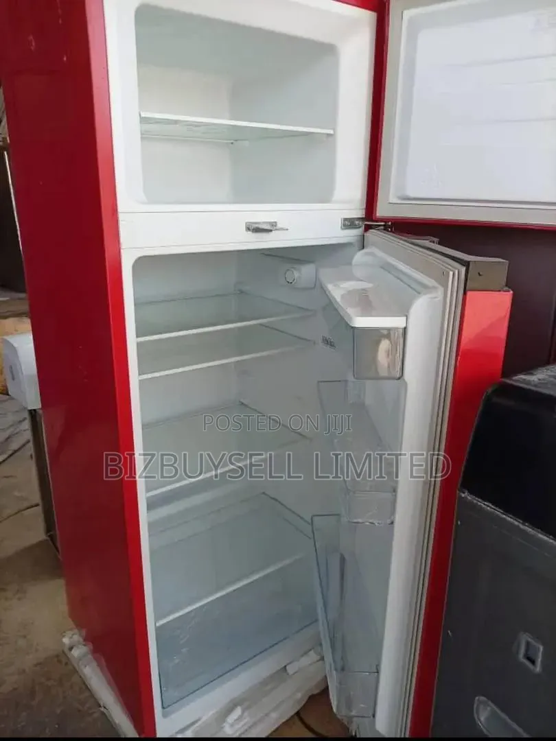 Double Door's Hisence Refrigerator With Water Dispenser.
