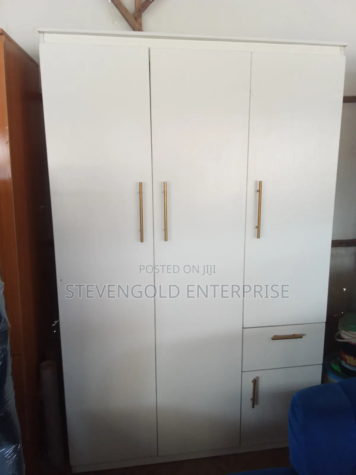 Modern White HDF Wardrobe With Elegant Gold Handles