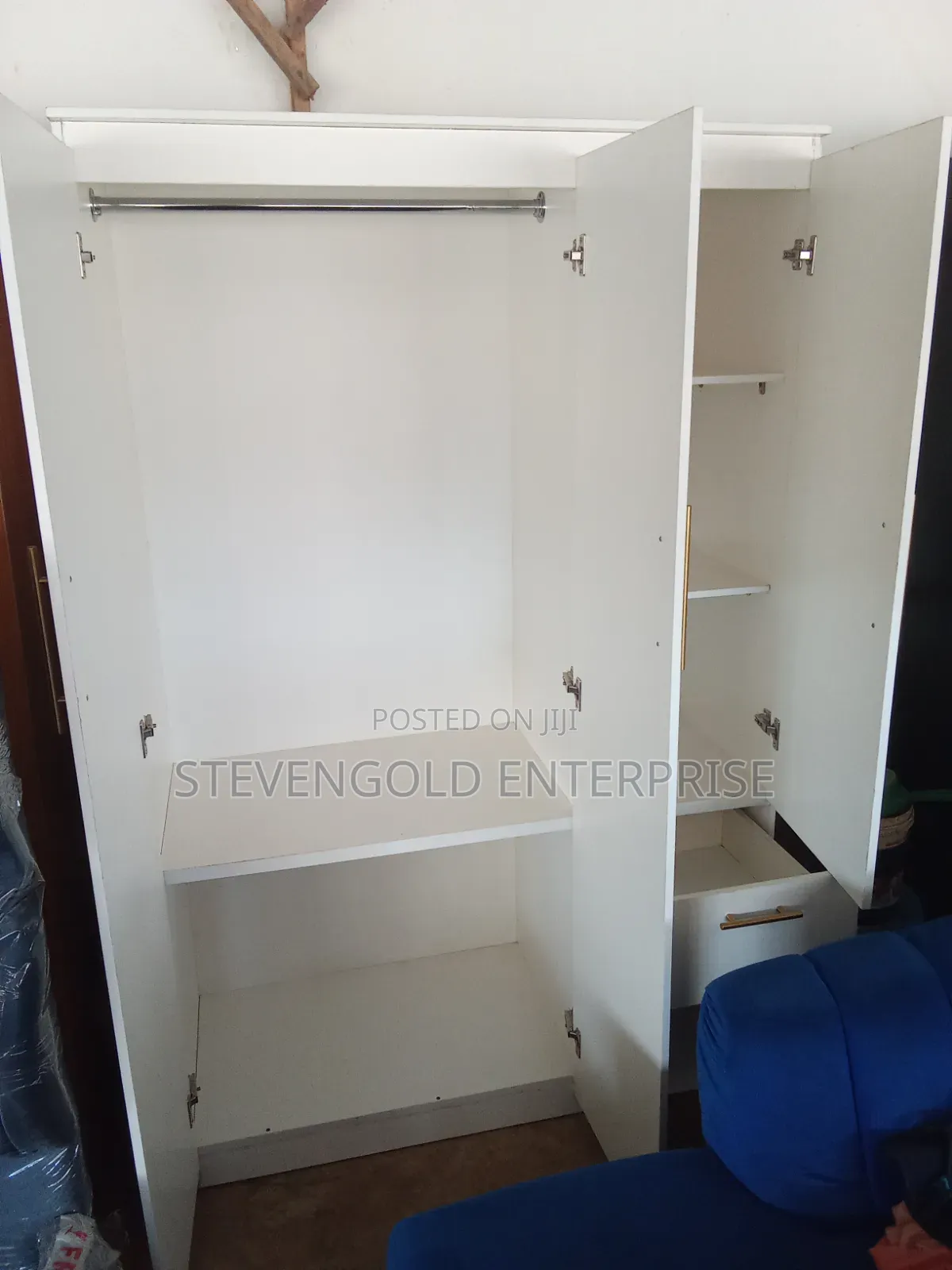 Modern White HDF Wardrobe With Elegant Gold Handles