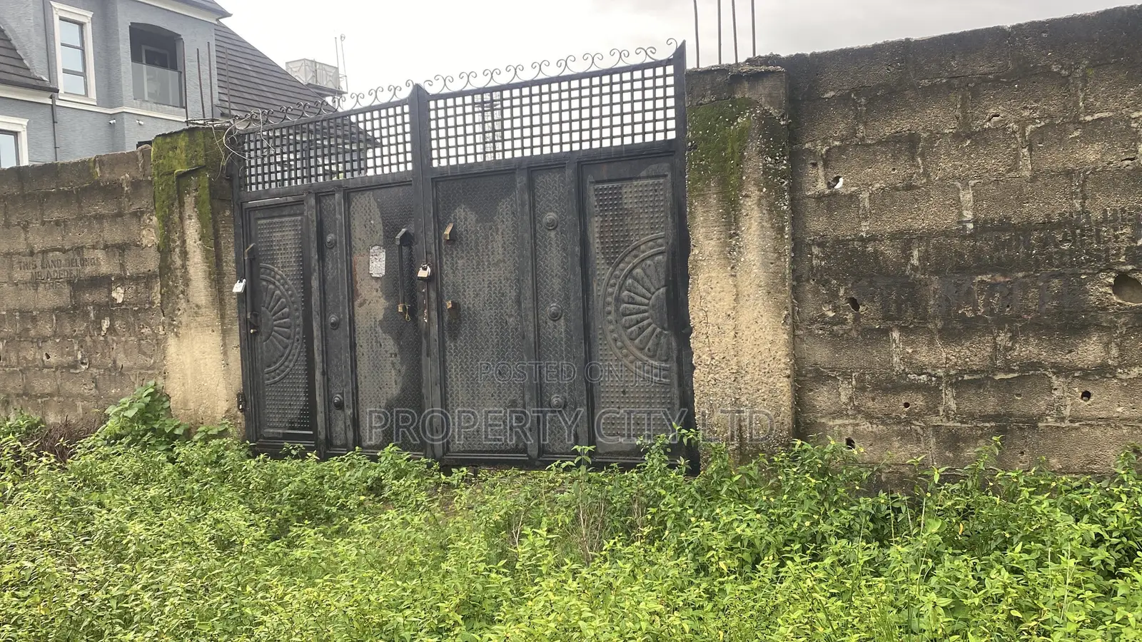 A Fenced and Gated Plot of Land With C/O