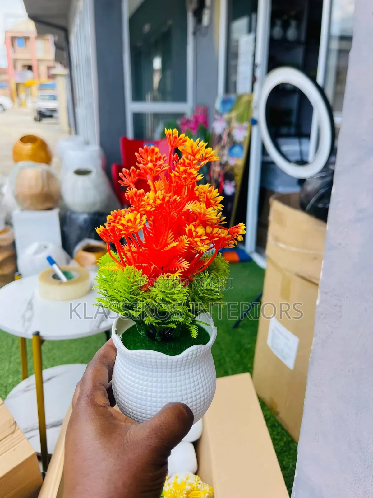 Quality Artificial Flowers in Stylish White Pot