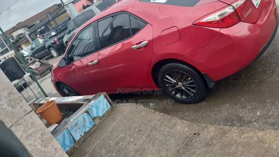 Toyota Corolla L 4dr Sedan (1.8L 4cyl 4A) 2014 Red