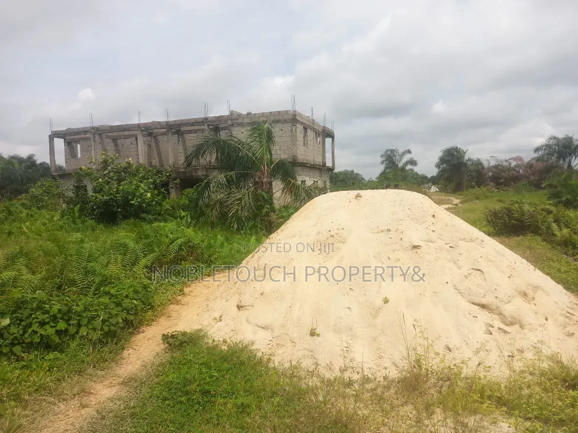 Commercial Half Plot of Land a Uncompleted Building