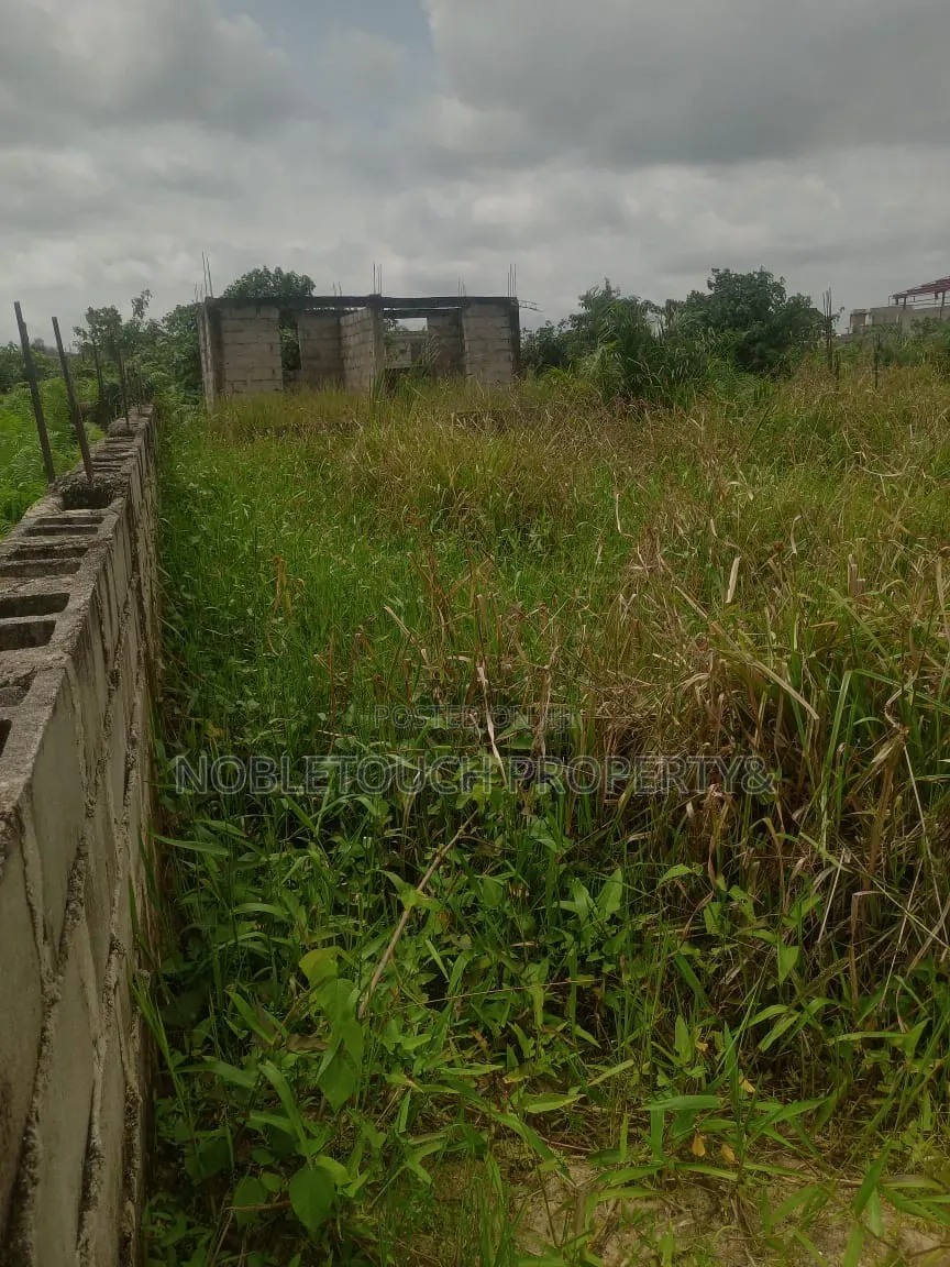 Commercial Half Plot of Land a Uncompleted Building